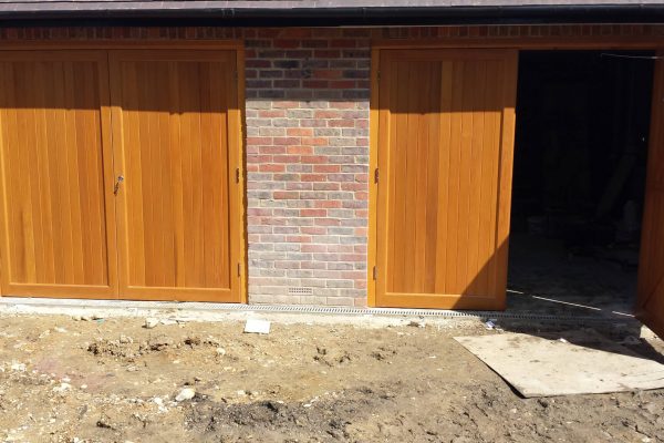 2 sets of Woodrite chalfont side hinged doors