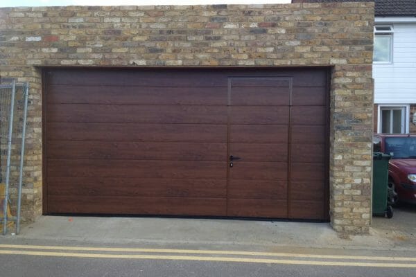 Hormann M-ribbed sectional with wicket door