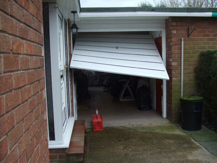 How to Fix a Crooked Garage Door