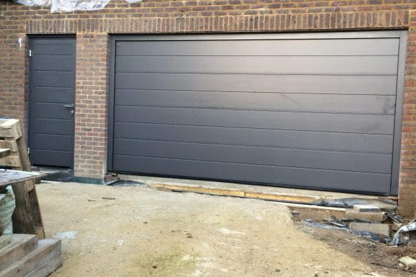 Hormann M-ridded sectional and matching side door