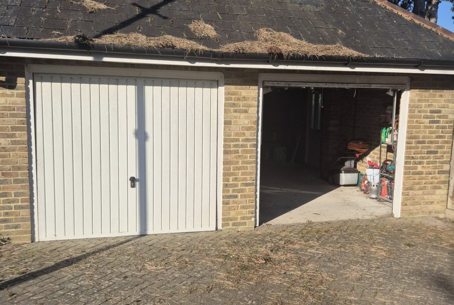 conversion of 2 single garage doors to a double door hertfordshire