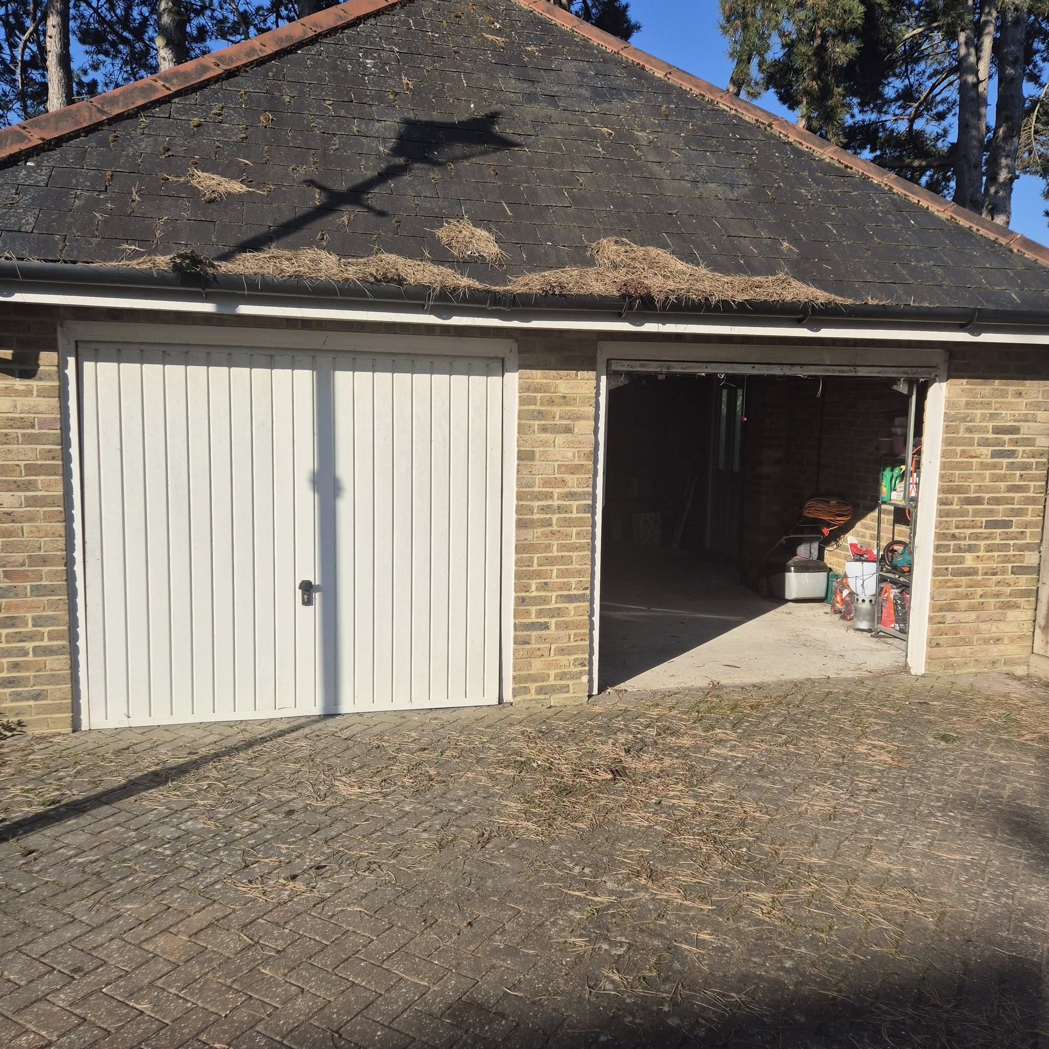 conversion of 2 single garage doors to a double door hertfordshire