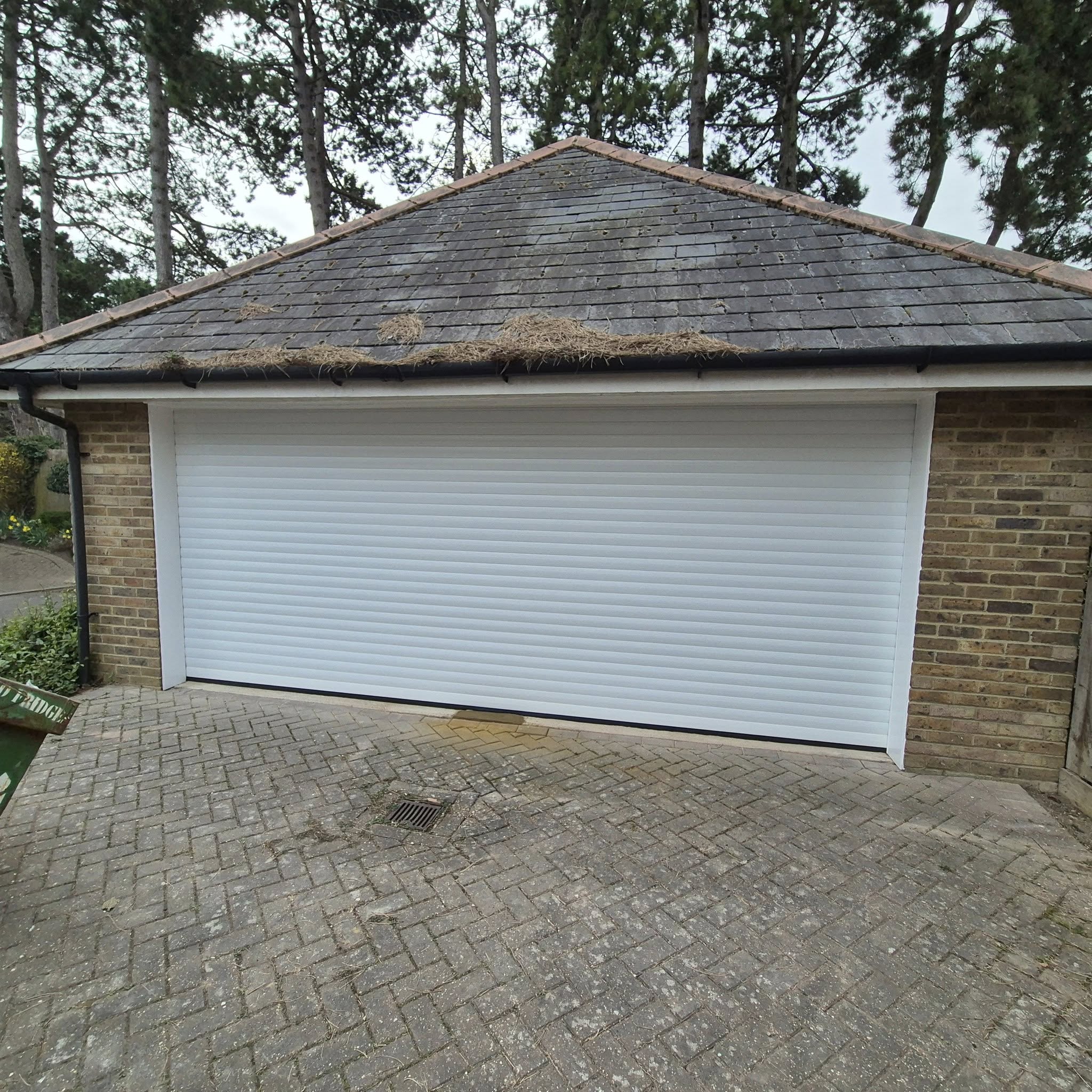new double garage door converted from 2 single garage doors