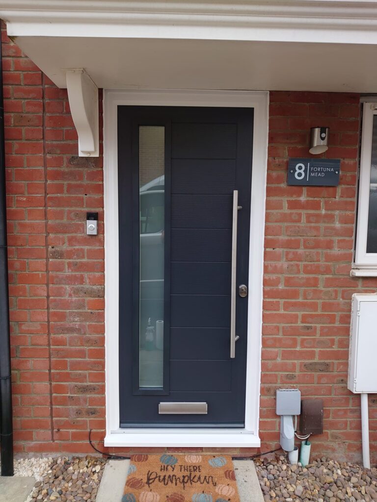 Anthracite grey composite front door installed in Leighton Buzzard